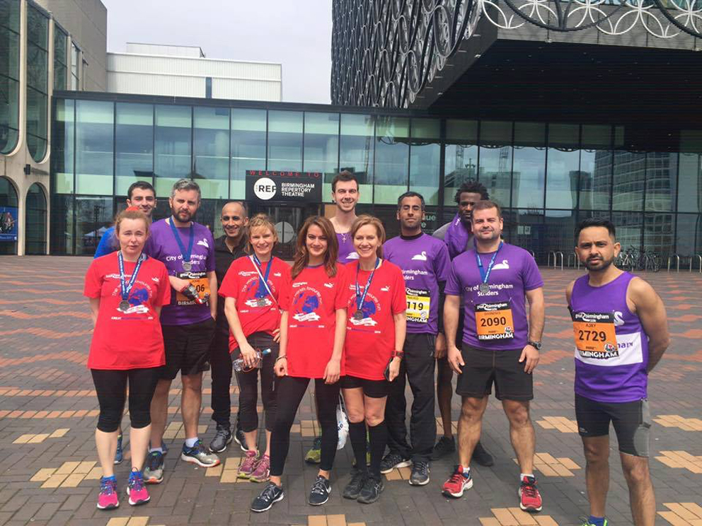 The City of Birmingham Striders with their 10K medals